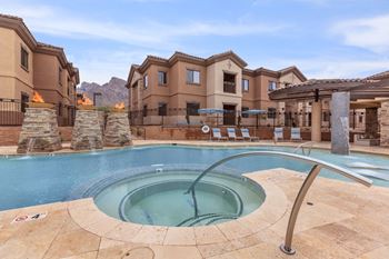 Take a dip in the hot tub at villas at houston levee west apartments in